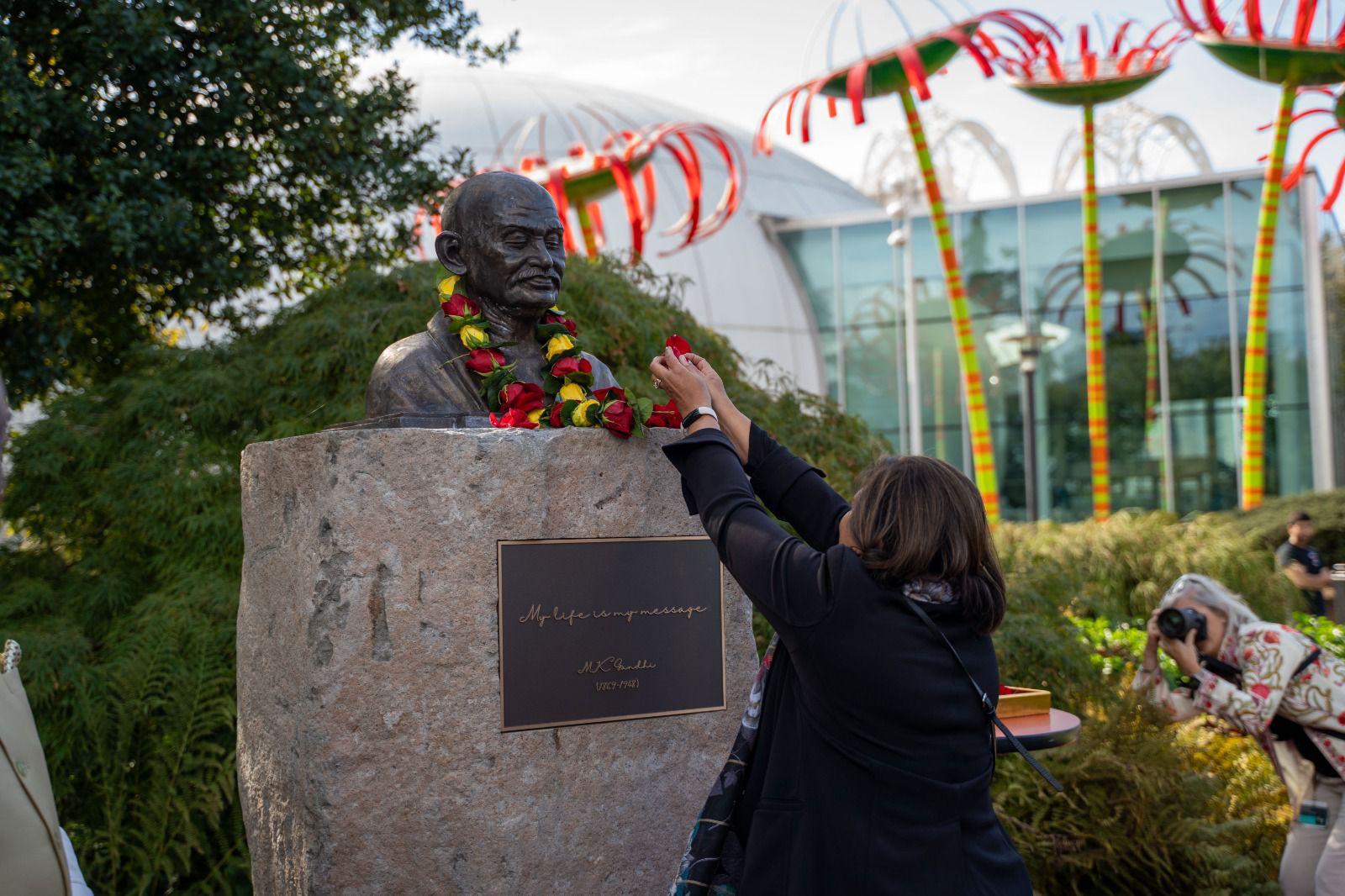  Washington State Senator Vandana Slatter paying floral tribute (02 October 2025, Seattle Center)