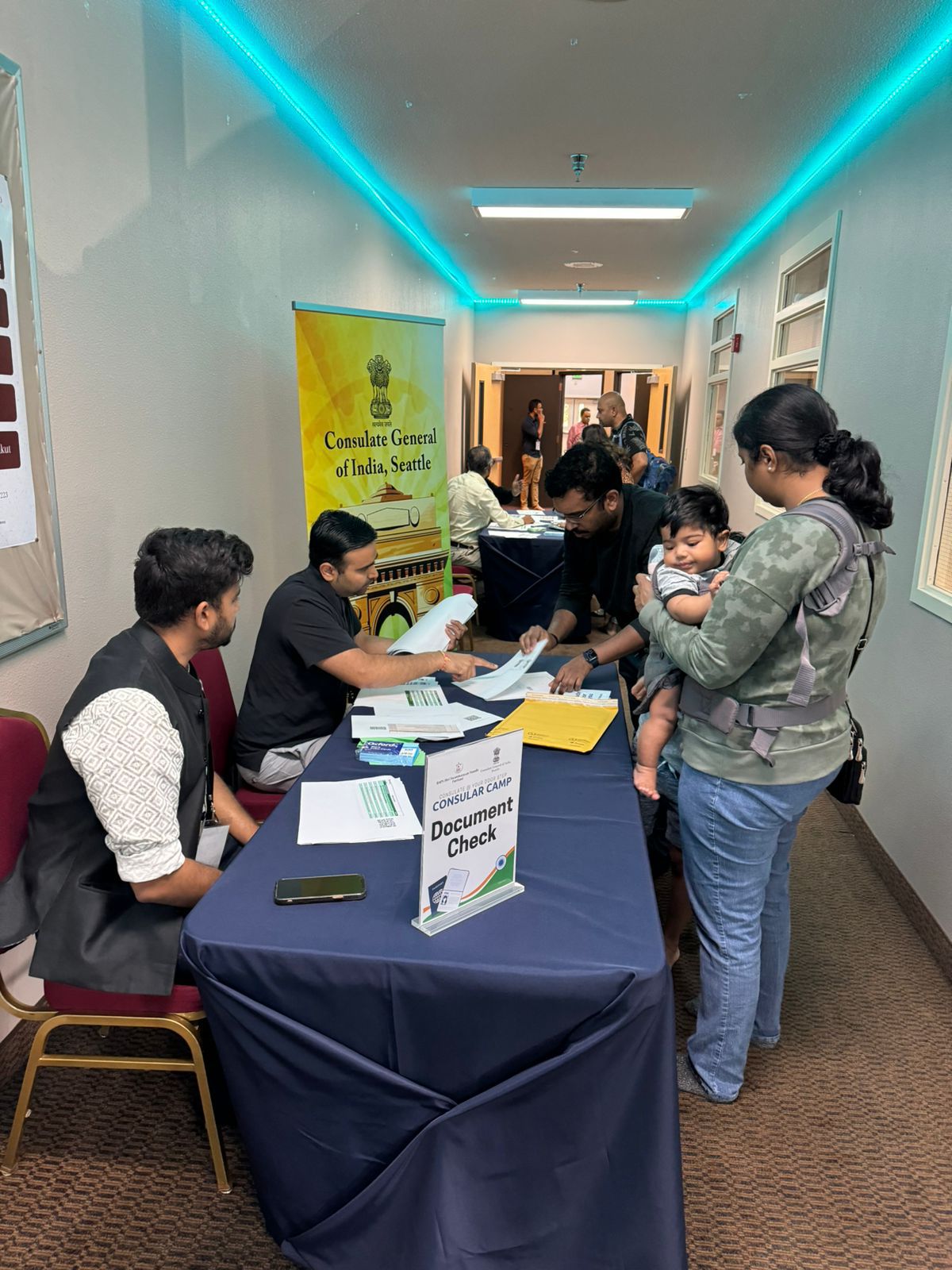  Applicants near the registration desk at the consular camp (10 August, Portland)