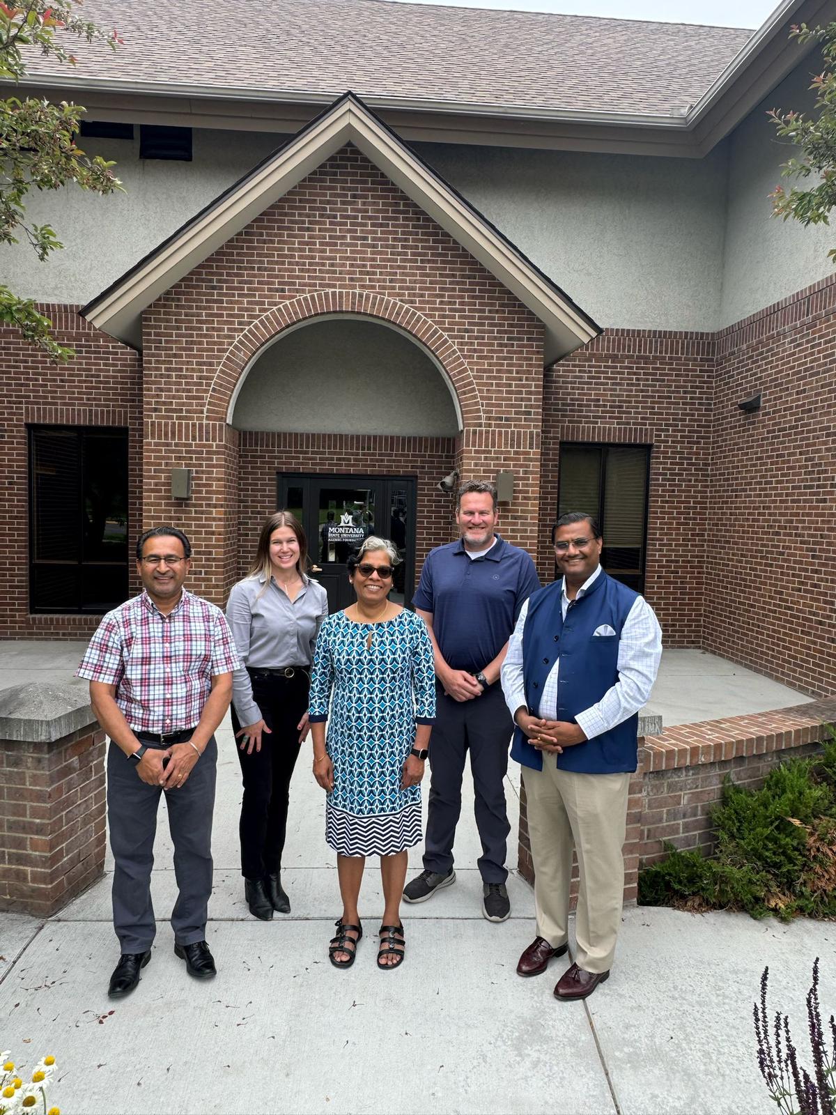  Meeting with Dr. Dilpreet Bajwa, Department Head for Mechanical and Industrial Engineering, Jesse Tufte, Senior Director of Development for the Montana State University Alumni Foundation, Dean Sreekala Bajwa of MSU’s College of Agriculture and Dr. Eric Belasco, Department Head of Agricultural Economics and Economics
(3 July, 2025, Bozeman, Montana). 
(From Left to Right)